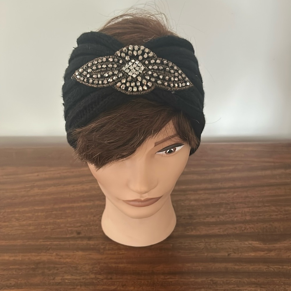 Black turban style headband with jeweled center